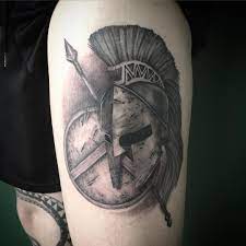 Spartan helmet tattoo designs are based on an ancient greek society who were renowned for their fierce warriors and formidable army. Xrysh Aygh Spartan Helmet Tattoo Helmet Tattoo Spartan Tattoo
