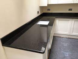 Matching black pearl granite with white cabinets is modern, and with oak classy. 27 Best Black Pearl Granite Countertops Design Ideas
