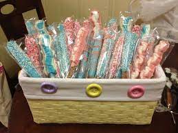 Easy Edible Favors Chocolate Covered Pretzels Cute If We Put Two In One Bag In The Gender Col Baby Shower Funny Baby Shower Chocolate Favors Baby Shower Bbq