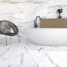 Calacatta wall tile will create a covetable golden hue that will always shine before you. 24x48 Emporio Matte Calacatta Marble Porcelain Tile