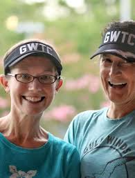 Still singing, running in the rain or shine at Potluck Bash