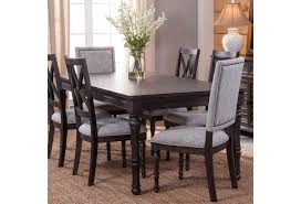 As i've mentioned, you can take your pick between a standard table, a counter table, and a bar. Steve Silver Linnett Transitional Dining Table With Table Leaf Standard Furniture Dining Tables