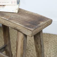 These stools also make handy side tables. Tall Rustic Wooden Stool