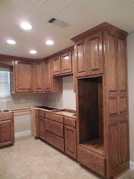 There's something about dark stained wood that absolutely screams luxury. Red Oak Raised Panels Minwax Provincial Stain Medium Rub Lacquer Stained Kitchen Cabinets Custom Kitchen Remodel Staining Cabinets