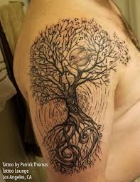 Done in black ink, the tree of life is represented through a mesmerizing circular. The Tree Of Life Tattoo Elegant Arts Tattoo