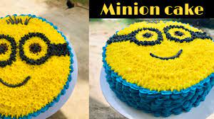 Next i made a whipped raspberry buttercream icing and assembled the cakes which i had roughly cut to size, i iced between each layer and then over the whole top of the cake. Minion Cake Buttericing Minion Youtube