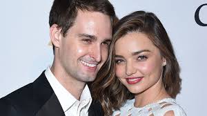 Miranda Kerr says her first kiss with fiance Evan Spiegel was like “the  first of my life”