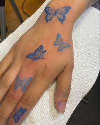 Butterflies Tattoo Pretty Hand Tattoos Butterfly Hand Tattoo Blue Ink Tattoos