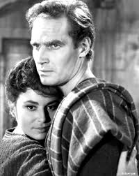 Charlton heston plays a palestinian jew who is battling the roman empire at the time of christ. Ben Hur 1959