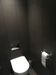 I have light color porcelain tiles (very light grey color, close to white) and much darker grey grout. Darkening Light Grey Grout In A Surrey Bathroom Shower Tile And Grout Cleaning Tips