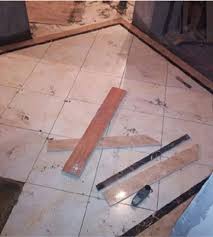 Having recently tiled by own bathroom floor, it was easier to remove the toilet and lay the 'whole' tiles and then to replace the toilet when the cement and grout had dried. Cement Sand Ratio For Tiles Flooring What Is Ratio Of Sand Cement Used To Fix Tiles On Floor
