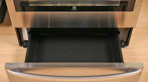 The most popular way to childproof drawers is by using a lock. Here S What The Bottom Drawer Of Your Oven Is For Cnet