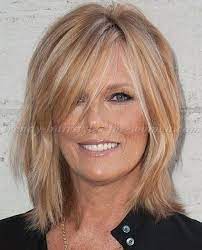 The layers falling from the chin to the shoulders can make the face look more oval and younger. Cool Shoulder Length Hairstyles For Women Over 50 15 Medium Length Hair Styles Medium Hair Styles Bangs With Medium Hair