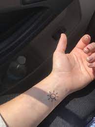 Small Sunshine Tattoo I Got Today It S The Size Of A Quarter Smalltattoo Sunshine Sun Tattoo Smal Sun Tattoo Small Small Forearm Tattoos Sunshine Tattoo