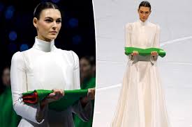 Supermodel Vittoria Ceretti carries Italian flag in crisp white Armani during Winter Olympics 2026 opening ceremony