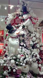 Maybe you would like to learn more about one of these? Christmas Tree Ideas Christmas Treesnowman Display From An Atlanta Showroom At The Ame Christmas Tree Themes Cool Christmas Trees Disney Christmas Decorations