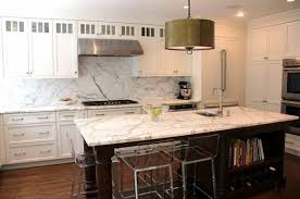 From creating additional storage space to becoming a focal point in and of itself, a kitchen island can have a major impact on the form and functionality of your home's heart and soul. Ny Cabinets