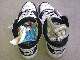 How To Dry Your Soaking Wet Shoes Faster Without Shrinking Them In The Dryer Simple Life Hacks Shoe Odor Garbage Bag