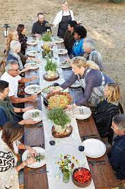 We won the 'best wedding caterer' award for the south east region of the uk! Caterers Bringing Food To Farm To Table Dinner Party By Trinette Reed For Stocksy United Dinner Party Table Dinner Table Setting Dinner Party Table Settings