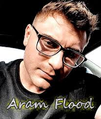 Meet Aram Flood. Aram will be singing Christmas songs outside City Hall  before the parade, then singing the National Anthem to begin the parade.  You may have seen him singing at the