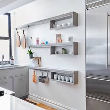 Hanging cubby shelf *see offer details. Gray Floating Shelves With Hanging Racks And Cubby Storage In Bright Modern Kitchen Hgtv