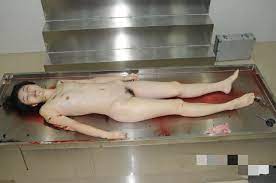 Naked women in morgue