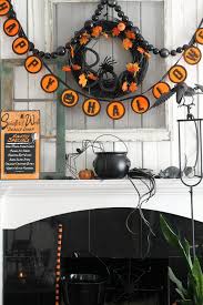 In decor it can be a bright pop of color and yes, we had a brown, black, and cream patterned kitchen carpet. Black White And Orange Halloween Decorating In Our Living Room The Wicker House