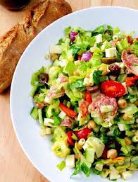 Remove the kernels from a grilled cob of corn to make this grilled corn salad that comes together with cherry tomatoes, diced red onion, bell pepper, plenty of fresh parsley, and a delicious creamy mustard vinaigrette and not a lettuce leaf in sight. Italian Chopped Salad Romaine Grape Tomatoes Chickpeas Artichoke Hearts Green And Black Olives Red Onion Healthy Recipes Summer Salads Delicious Salads