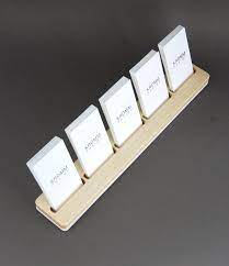 Made from durable galvanized metal, this rustic, business card holder features a weathered finish and metal chicken wire for an aesthetic that's sure to bring out the country in you. Multiple Business Card Stand 5 Card Maple Wood Display Maple And White Acrylic Card Business Card Stand Business Card Holder Display Business Card Displays