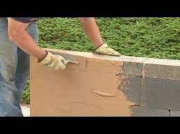 Video This Video Shows You How To Build A Dry Stack Concrete Block Wall Without Mortar Using Quikrete Cinder Block Walls Cinder Block Garden Block Walls