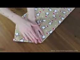 To make your bag, start by cutting off a piece of wrapping paper. How To Make A Gift Bag Out Of Wrapping Paper For Odd Shaped Gifts Youtube