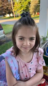 Cherishing morning hair styling moments with daughter