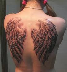 definitely a set of wings size and length perfect and 3d effect don t like how it looks like it growin wings tattoo wing tattoos on back angel wings tattoo