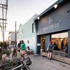 Most of the restaurant's employees live in the outer sunset, and between 60 and 70 people from the community chipped in to help build out the space, which features warm wooden panels, stools, and tables all made out of reclaimed douglas fir. Outer Sunset Hook Fish Co Expands To Mill Valley Surf Store Proof Lab Eater Sf