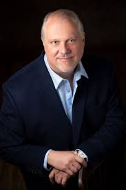 People in Business: Dr. Mark Bourcier has purchased the dental practice of  Dr. Donald Willett in Feeding Hills