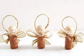 Lovely little upcycled ornament made of wine cork, wooden ball, ribbon, and spanish moss. How To Make Wine Cork Angels Wine Cork Angel Ornaments