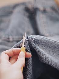Take your scissors or blade and make a small horizontal cut where you marked the jeans. A Complete Guide To Distressing Denim The Vic Version