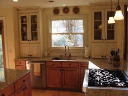 cream lower stained upper cabinets we