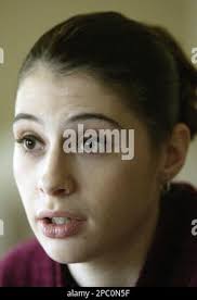 Joy Oakes, 26, sister of Staff Sgt. Raymond Girouard, speaks during an  interview at her grandfather's home Friday, Feb., 2007 in Sweetwater, Tenn.  The 24-year-old staff sergeant with the 101st Airborne Division,