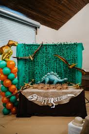 Dinosaur Birthday Party Favor Table Dinosaur Birthday Party Dinosaur Birthday Party Decorations Dinosaur Themed Birthday Party