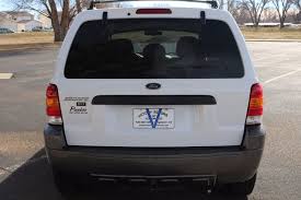 Image result for Oxford White 2005 Escape