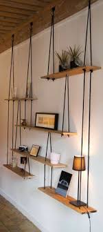 Hanging Shelves Made From A Simple Wood Planks And Cord Interestinginteriors Diy Hanging Shelves Home Diy Diy Home Decor