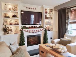 Christmas Decor With Fireplace And Built Ins All The Festive Feels You Ll Need Christmas Decorations Living Room Christmas Bookshelf Christmas Living Rooms