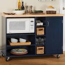 Iwell tall kitchen baker's rack with storage cabinet & 8 hooks, microwave stand with 3 shelves, microwave cabinet with storage, cupboard, sideboard, utility. Ebern Designs Drolet Kitchen Cart Solid Wood Wayfair Kitchen Design Small Kitchen Furniture Microwave In Kitchen