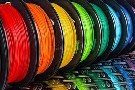 Colorful Bright Row Of Spool 3d Printer Filament Black Metal Background Colorfu Ad Printer Filament Metal Background 3d Printer Filament Black Metal