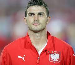 Começou a carreira no polónia varsóvia, por onde saiu e voltou.depois passou por vários clubes: Michal Zewlakow Po Sezonie Przejdzie Do Legii Gol24