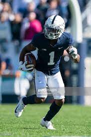 Penn State Nittany Lions Wide Receiver Kj Hamler Runs Back A Punt Penn State Nittany Lions Penn State College Football Uniforms