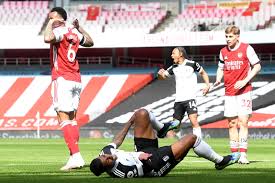 Arsenal's granit xhaka is tackled by fulham's michael hector as arsenal's alexandre lacazette appeals to the referee. 4tznulmaykm3xm