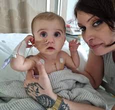 Parents inspired by 'warrior' baby after major heart surgery