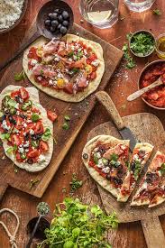 How many calories are in a flatbread pizza? Grilled Greek Flatbread Pizza Recipe The Fresh Times Flatbread Pizza Recipes Greek Flatbread Pizza Flatbread Pizza